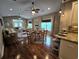 Open concept dining area with hardwood floors and ample natural light at 1735 24Th Ave. N, North Myrtle Beach, SC 29582