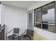 Private balcony with wicker chairs, offering a relaxing outdoor space at 2001 S Ocean Blvd. # 1102, Myrtle Beach, SC 29577