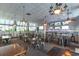 Spacious common area with tables, chairs, and bar; great for relaxing or socializing at 2001 S Ocean Blvd. # 1102, Myrtle Beach, SC 29577