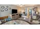 Combined dining and living area with a round table and comfortable seating at 2001 S Ocean Blvd. # 1102, Myrtle Beach, SC 29577