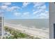 Stunning ocean view from balcony, showcasing beach and shoreline at 2001 S Ocean Blvd. # 1102, Myrtle Beach, SC 29577