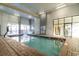 Indoor swimming pool with brick surround; perfect for a refreshing dip at 2001 S Ocean Blvd. # 1102, Myrtle Beach, SC 29577