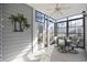 Relaxing screened porch with table and chairs at 219 Moonglow Circle # 102, Murrells Inlet, SC 29576