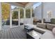 Relaxing screened porch with comfy seating and view of backyard at 251 Waties Dr., Murrells Inlet, SC 29576