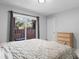 Main bedroom with sliding door to private patio access at 305 S 21St Ave. S # 112, Myrtle Beach, SC 29577