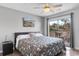 Bedroom with private balcony and ceiling fan at 305 S 21St Ave. S # 112, Myrtle Beach, SC 29577