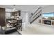 Modern kitchen and dining area with dark wood cabinets and marble floors at 305 S 21St Ave. S # 112, Myrtle Beach, SC 29577