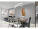 Bright dining area with a modern table and chairs at 305 S 21St Ave. S # 112, Myrtle Beach, SC 29577