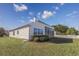 House exterior showcasing a sunroom and side yard at 3132 Robins Nest Way, Myrtle Beach, SC 29579