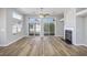 Living room with hardwood floors, fireplace and sliding doors at 3132 Robins Nest Way, Myrtle Beach, SC 29579