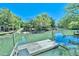 Wooden dock extending into calm water with lush greenery in the background at 3563 Sunfish St., Murrells Inlet, SC 29576