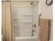 Clean bathroom with shower/tub combo and built-in shelving at 4730 Cottonwood Dr., Myrtle Beach, SC 29588