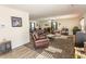 Bright living room with leather furniture and hardwood floors at 4730 Cottonwood Dr., Myrtle Beach, SC 29588