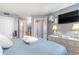 King bed in a bright bedroom with ensuite bathroom access at 5523 N Ocean Blvd. # 1812, Myrtle Beach, SC 29577