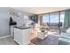 Living room with ocean view, balcony access, and comfortable seating at 5523 N Ocean Blvd. # 1812, Myrtle Beach, SC 29577