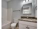 Bathroom with granite countertop and updated vanity at 5801 Oyster Catcher Dr. # 1022, North Myrtle Beach, SC 29582
