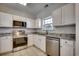 Updated kitchen with granite countertops at 5801 Oyster Catcher Dr. # 1022, North Myrtle Beach, SC 29582