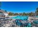 Community pool with seating area at 5801 Oyster Catcher Dr. # 1022, North Myrtle Beach, SC 29582