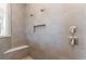 Walk-in shower with multiple shower heads and built-in seat at 5987 Bolsena Place, Myrtle Beach, SC 29577