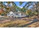 Side view of a single story house with mature trees at 602 3Rd Ave. N, Myrtle Beach, SC 29577