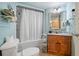 Bathroom with tub, toilet and vanity. Light and bright at 7100 N Ocean Blvd. # 424, Myrtle Beach, SC 29572