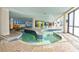 Indoor pool area with a unique shape and kiddie section at 7100 N Ocean Blvd. # 424, Myrtle Beach, SC 29572