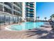 Large outdoor pool with plenty of lounge chairs at 7100 N Ocean Blvd. # 424, Myrtle Beach, SC 29572