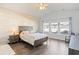 Spacious main bedroom with wood-look floors and wall accent at 714 Little Fawn Way, Myrtle Beach, SC 29579