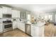 Modern kitchen with stainless steel appliances and granite countertops at 725 Isle Verde Dr, Myrtle Beach, SC 29579