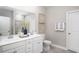 Elegant bathroom with double vanity, large mirror, and stylish finishes at 729 Isle Verde Dr, Myrtle Beach, SC 29579