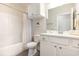 Clean bathroom with white vanity and a bathtub at 76 Eagle Pass Dr., Murrells Inlet, SC 29576