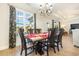 Elegant dining room featuring a wood table and water views at 76 Eagle Pass Dr., Murrells Inlet, SC 29576