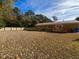 Spacious backyard with deck, and wooded area at 100 Dorman Circle, Myrtle Beach, SC 29577