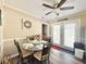 Cozy dining area with glass-top table and four chairs, adjacent to the kitchen at 100 Dorman Circle, Myrtle Beach, SC 29577