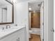 Bathroom with single vanity, white cabinets and tub shower combo at 101 Westhill Circle # 5-C, Myrtle Beach, SC 29572