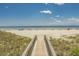 Wooden walkway to sandy beach with ocean view at 101 Westhill Circle # 5-C, Myrtle Beach, SC 29572