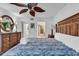 Main bedroom with king bed, wood furniture and ensuite bathroom at 101 Westhill Circle # 5-C, Myrtle Beach, SC 29572