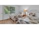 Bedroom with two twin beds, tropical bedding and window seating at 101 Westhill Circle # 5-C, Myrtle Beach, SC 29572