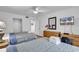 Bedroom with two twin beds, wood furniture and access to a second bathroom at 101 Westhill Circle # 5-C, Myrtle Beach, SC 29572
