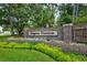 Kingston Plantation community entrance with brick wall and landscaping at 101 Westhill Circle # 5-C, Myrtle Beach, SC 29572