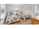 Well-lit guest bedroom with two twin beds, and plantation shutters at 101 Westhill Circle # 5-C, Myrtle Beach, SC 29572