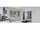 Modern kitchen features white cabinetry, stainless steel appliances, and white countertops at 101 Westhill Circle # 5-C, Myrtle Beach, SC 29572