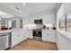 Modern white kitchen with stainless steel appliances at 101 Westhill Circle # 5-C, Myrtle Beach, SC 29572