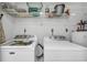 Laundry room with a washer and dryer, and ample shelving at 101 Westhill Circle # 5-C, Myrtle Beach, SC 29572