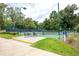 Tennis court with seating area and well-maintained grounds at 101 Westhill Circle # 5-C, Myrtle Beach, SC 29572
