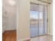 Bedroom with sliding glass door to balcony and wire shelving in closet at 1425 Teague Rd. # 401, Myrtle Beach, SC 29577