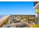 Aerial view of coastline, beach, and buildings at 1605 S Ocean Blvd. # 1807, Myrtle Beach, SC 29577