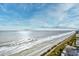 Aerial view of beach and oceanfront building at 1605 S Ocean Blvd. # 1807, Myrtle Beach, SC 29577