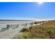 Stunning oceanfront view with pristine sand and clear blue water at 1605 S Ocean Blvd. # 1807, Myrtle Beach, SC 29577