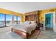Spacious bedroom with ocean view and large bed at 1605 S Ocean Blvd. # 1807, Myrtle Beach, SC 29577